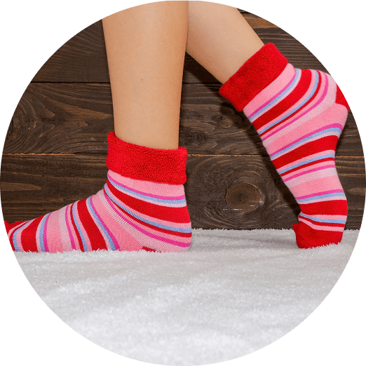 Striped socks on wooden floor