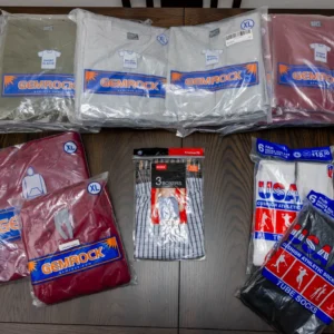 Assorted shirts and socks in packaging